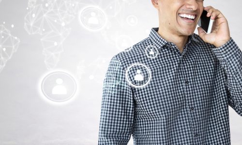 cheerful-man-talking-phone